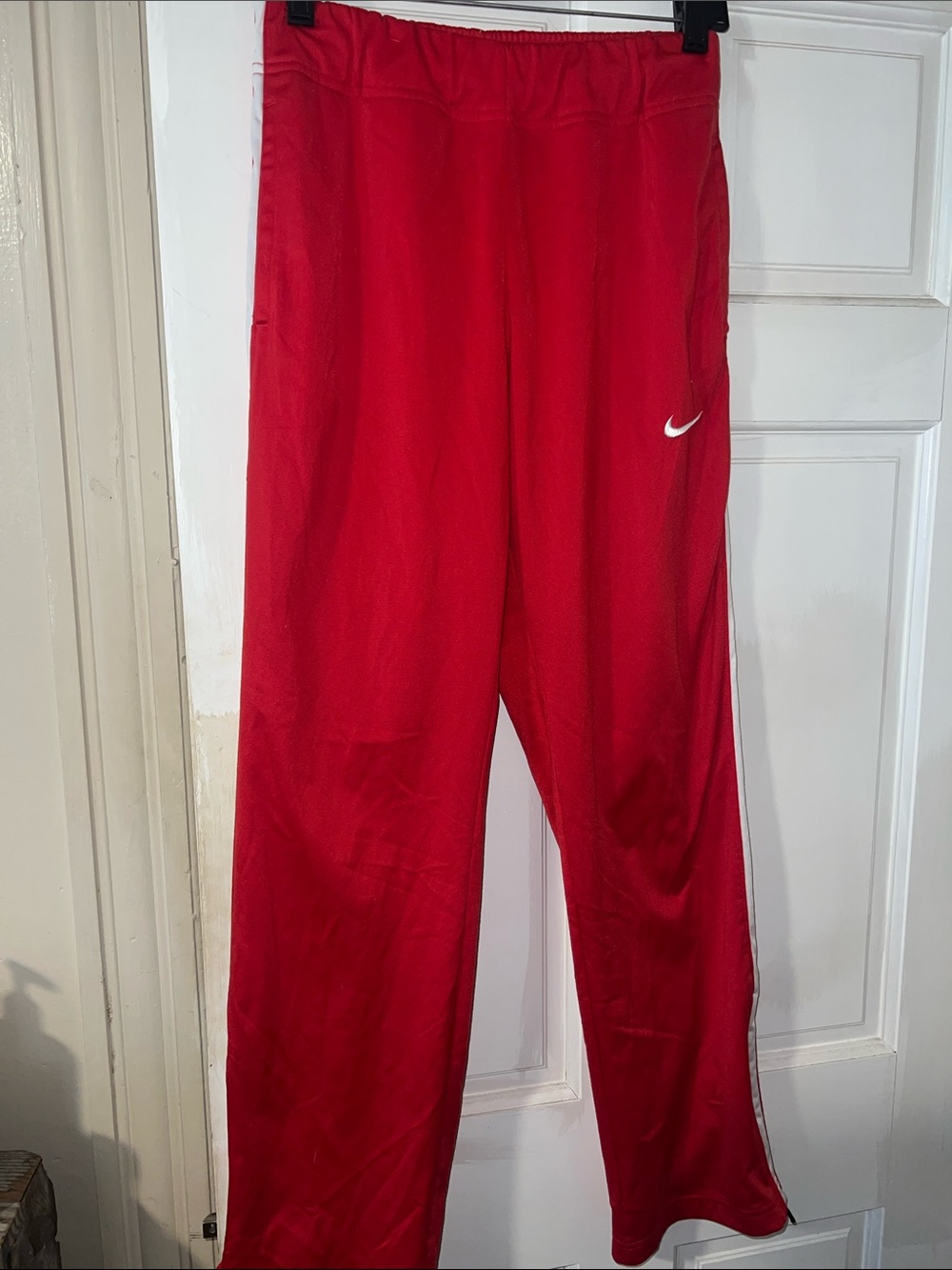 Nike Women’s Red Track Pants with White Swoosh